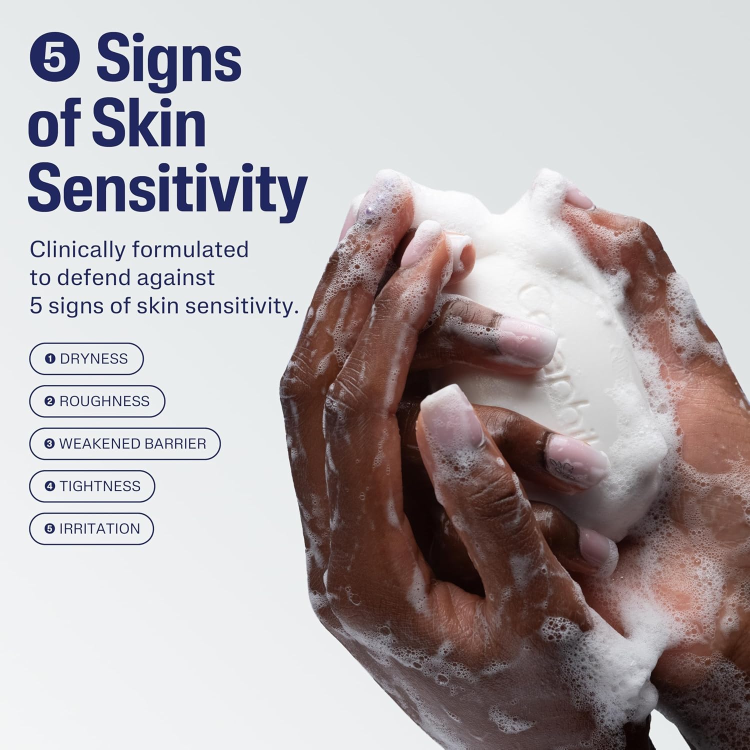 Hands holding a bar of soap with text about skin sensitivity and product features.