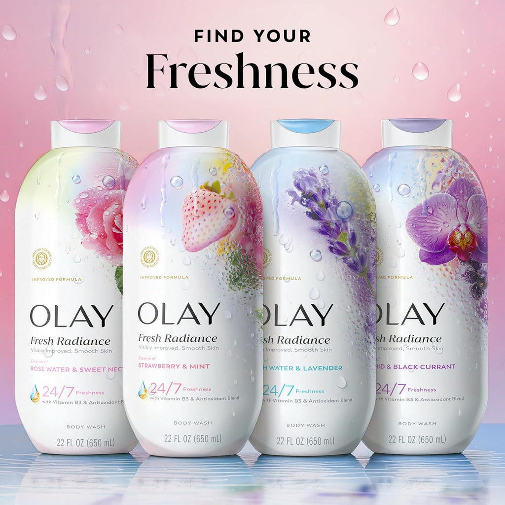 Four Olay Fresh Radiance body wash bottles lined up against a pink water droplet background with the headline 'FIND YOUR Freshness.' The bottles feature floral graphics: pink rose, strawberry and mint, lavender, and a purple orchid.