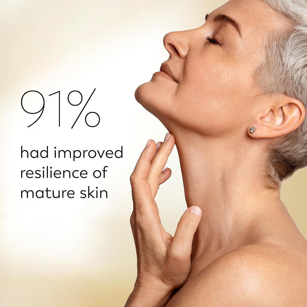 A close-up of a woman with short gray hair touching her neck, with text on the left reading '91% had improved resilience of mature skin' on a soft beige background.