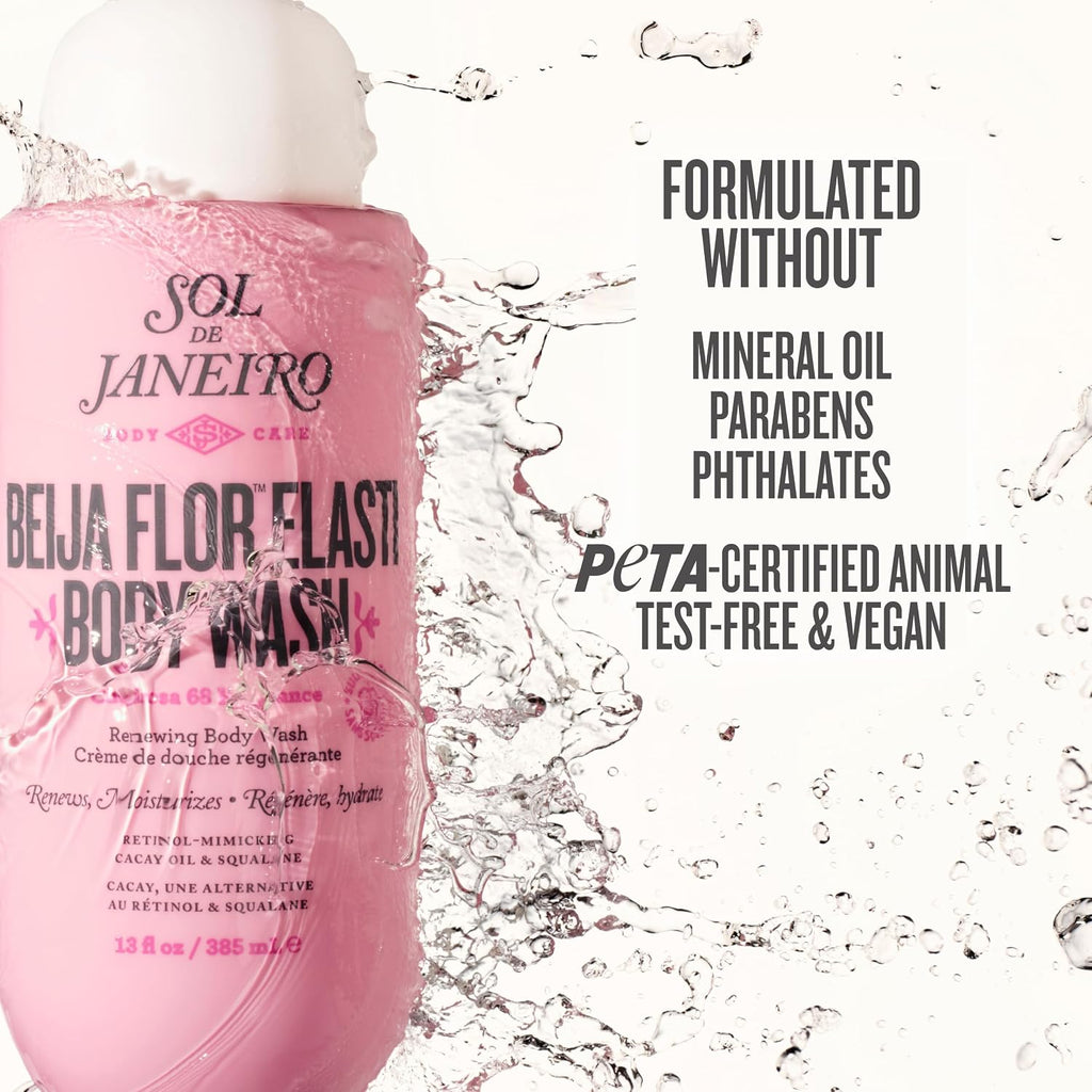 Pink bottle of Sol de Janeiro body wash with water splashes on a white background