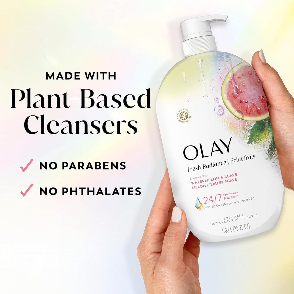 Olay body wash bottle held by a hand with text about plant-based cleansers and ingredient safety.
