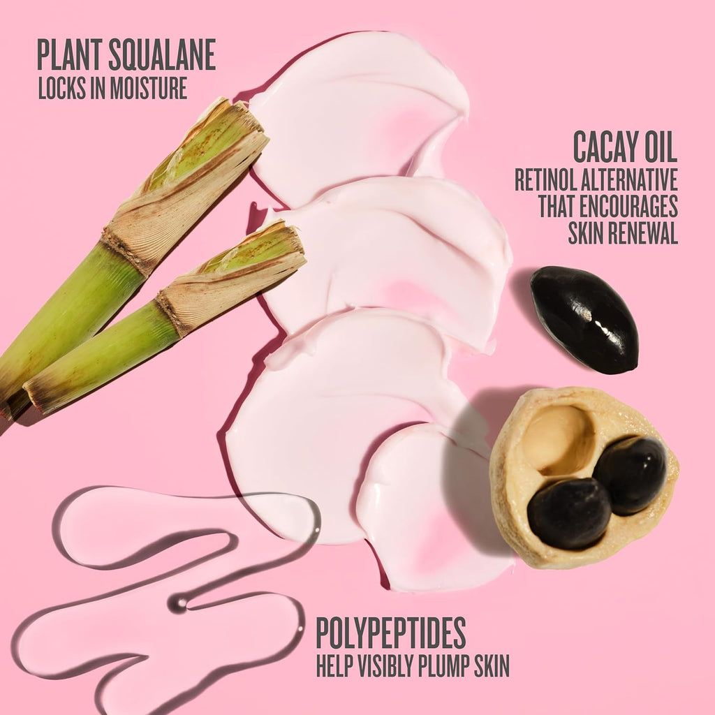 Cosmetic product with ingredients on a pink background
