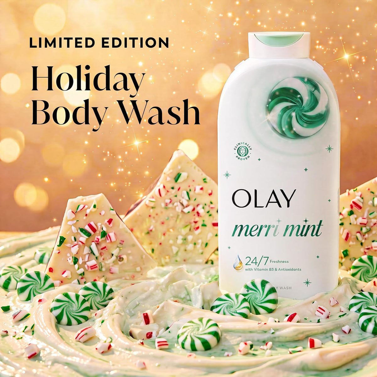 Olay Merry Mint Limited Edition Holiday Body Wash bottle displayed with festive holiday-themed props including peppermint swirls, candy canes, and white chocolate pieces on a warm golden bokeh background.