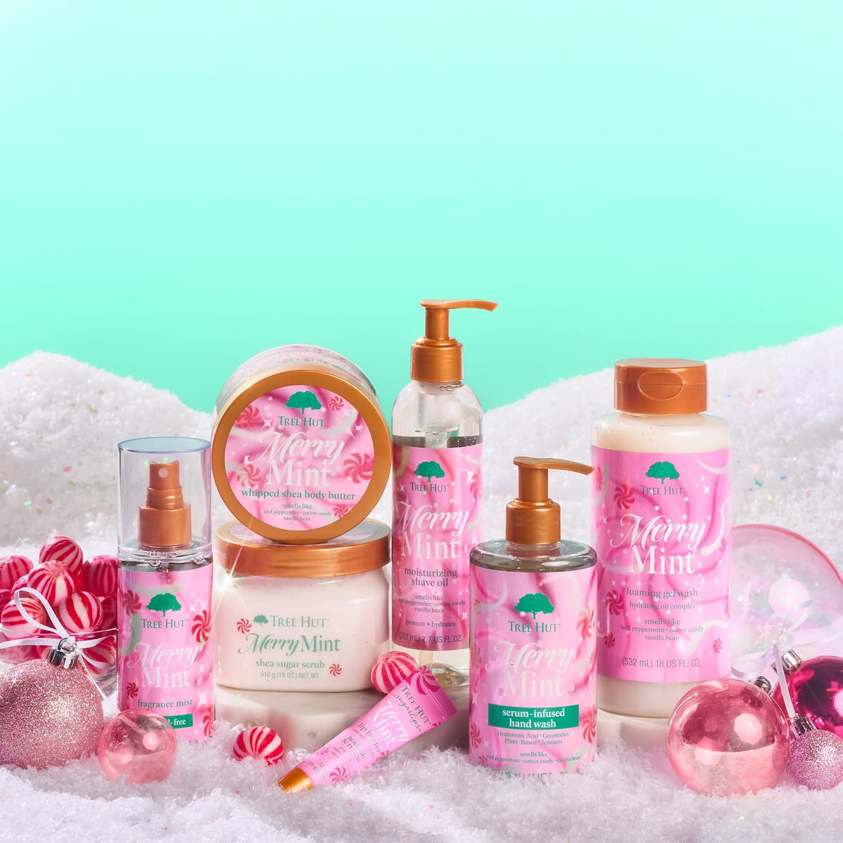 Collection of Merry Mint skincare products on a textured surface with a light green background