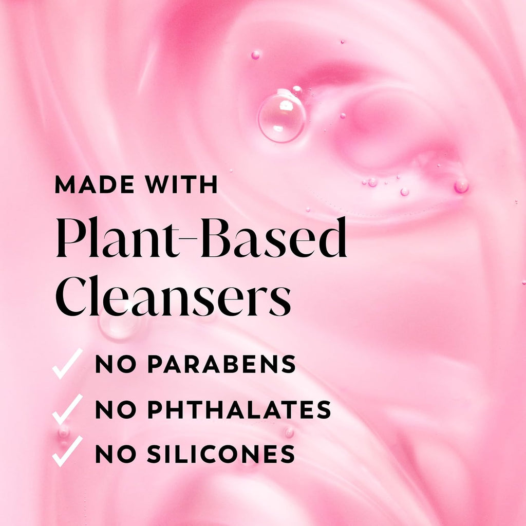 Pink graphic with text reading 'MADE WITH Plant-Based Cleansers' and checkmarks for 'NO PARABENS', 'NO PHTHALATES', and 'NO SILICONES' over a glossy pink background with droplets.