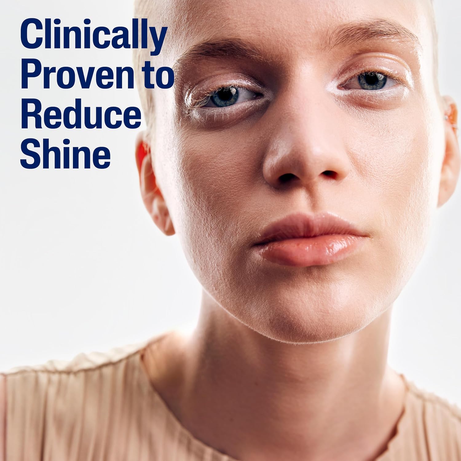 Close-up of a person's face with text 'Clinically Proven to Reduce Shine' on a white background