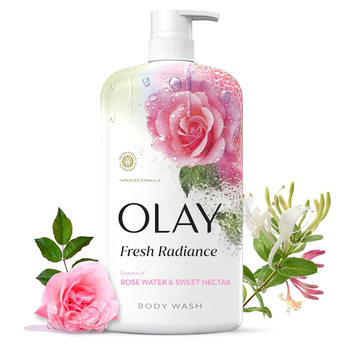 A bottle of Olay Fresh Radiance body wash with a white pump, decorated with pink rose and white honeysuckle floral graphics, set against a clean white background with loose floral props.