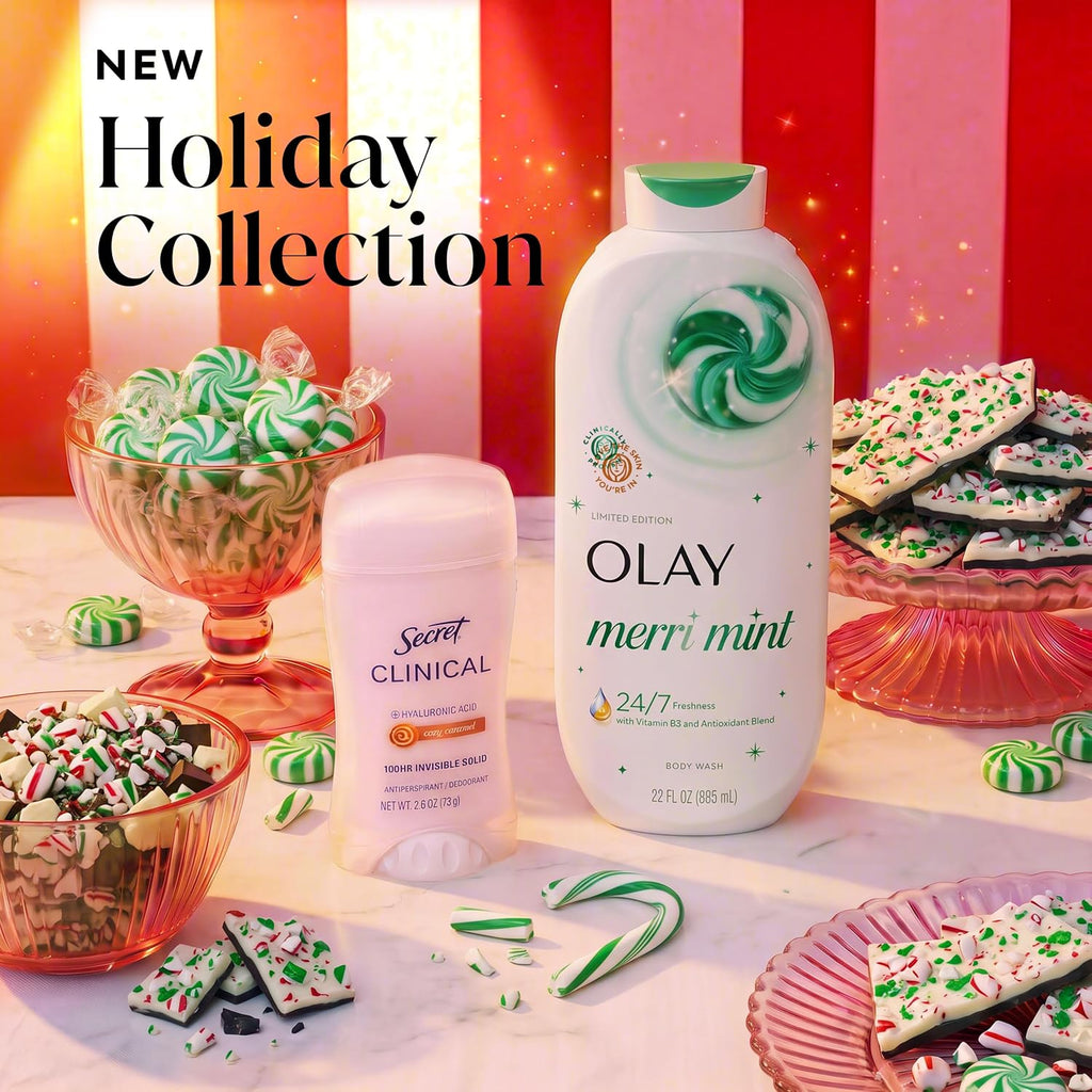 Holiday-themed Olay and Secret Clinical body care collection ad with a large Olay Merri-Mint body wash bottle and a Secret Clinical body spray bottle, surrounded by candy canes, peppermint candies, and holiday cookies on a festive striped red, pink, and white background with the text 'NEW Holiday Collection'.