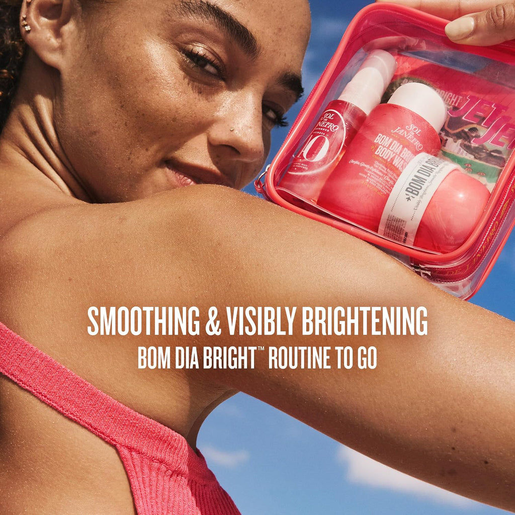 Woman holding a travel-sized skincare kit with text 'Smoothing & Visibly Brightening Bom Dia Bright Routine to Go'.