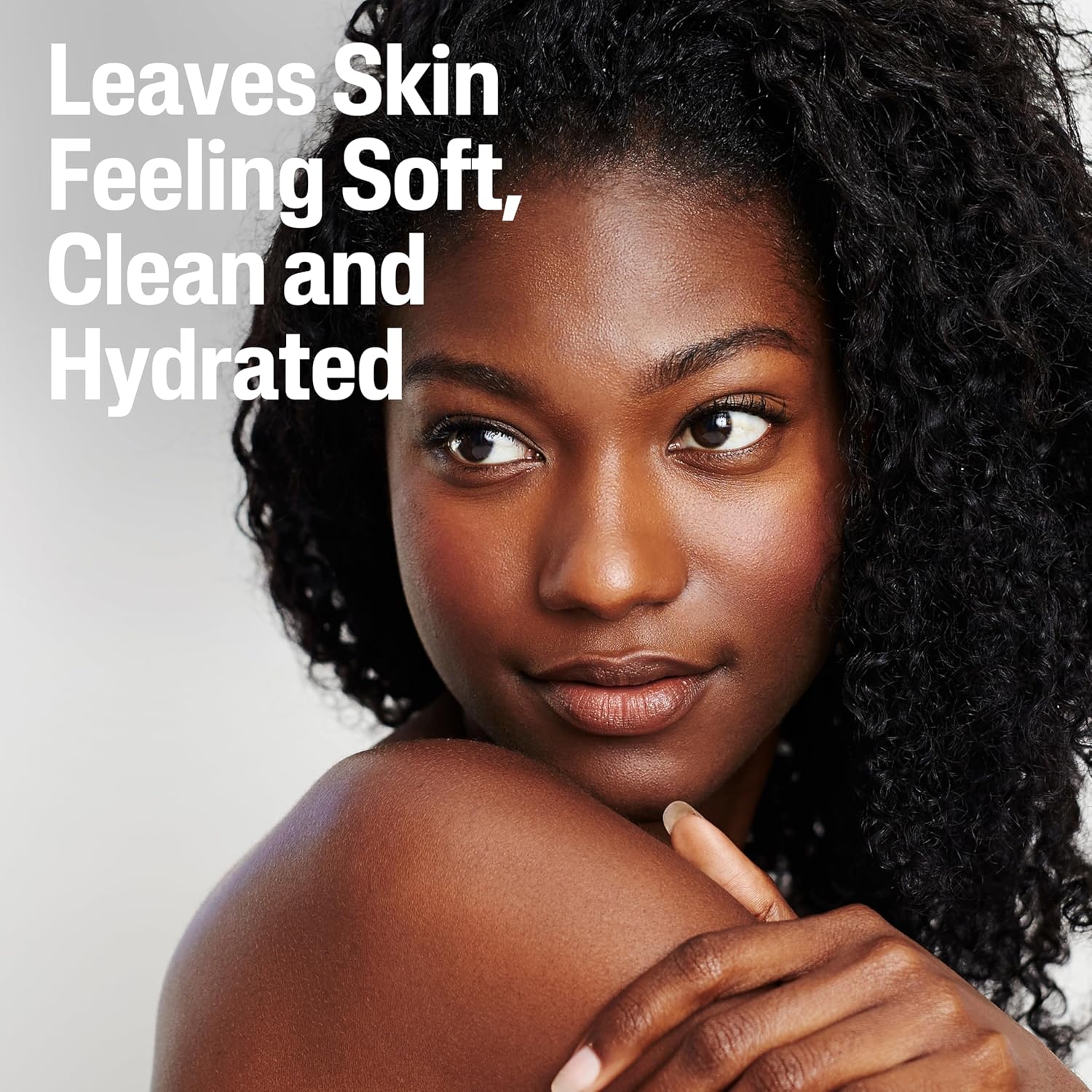 Woman with soft skin texture, text 'Leaves Skin Feeling Soft, Clean and Hydrated' on a light gray background