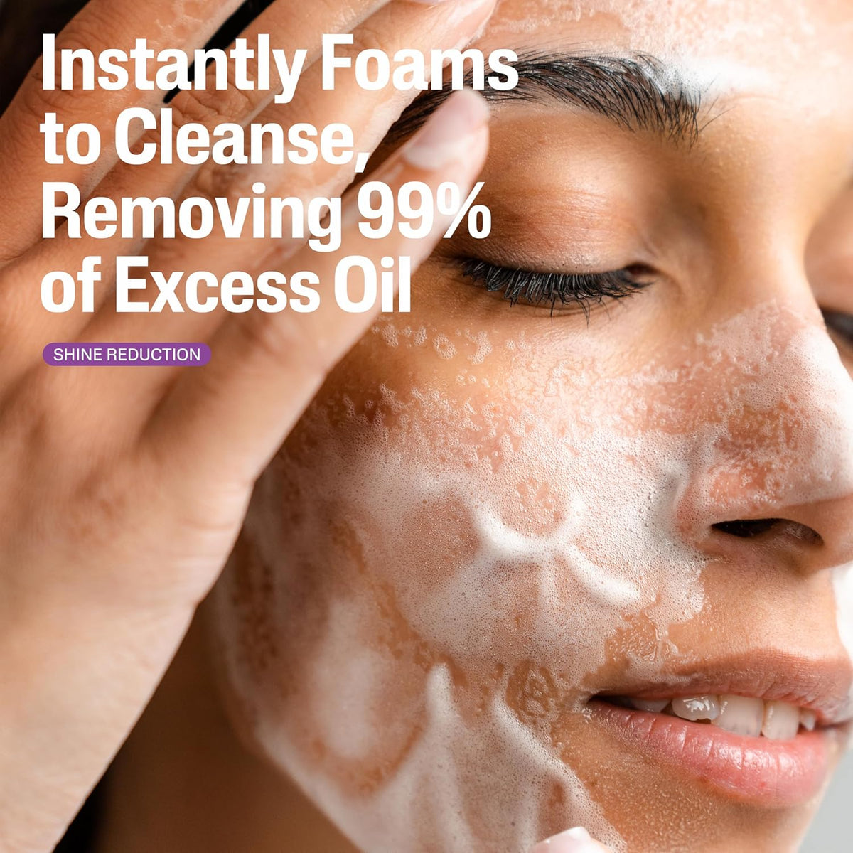 Person applying a foaming facial cleanser with text highlighting its oil-reducing properties.