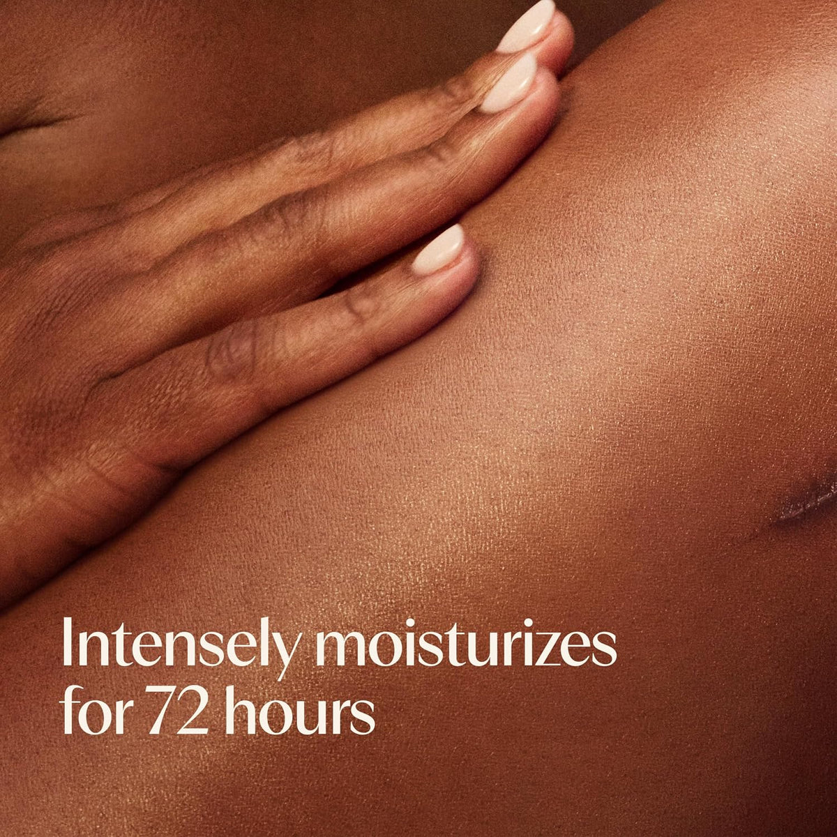 Hand touching skin with text 'Intensely moisturizes for 72 hours' on a brown background