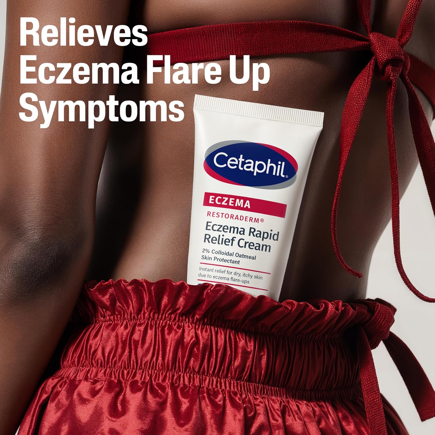 Cetaphil Eczema Rapid Relief Cream with text 'Relieves Eczema Flare Up Symptoms' on a person wearing red pants.
