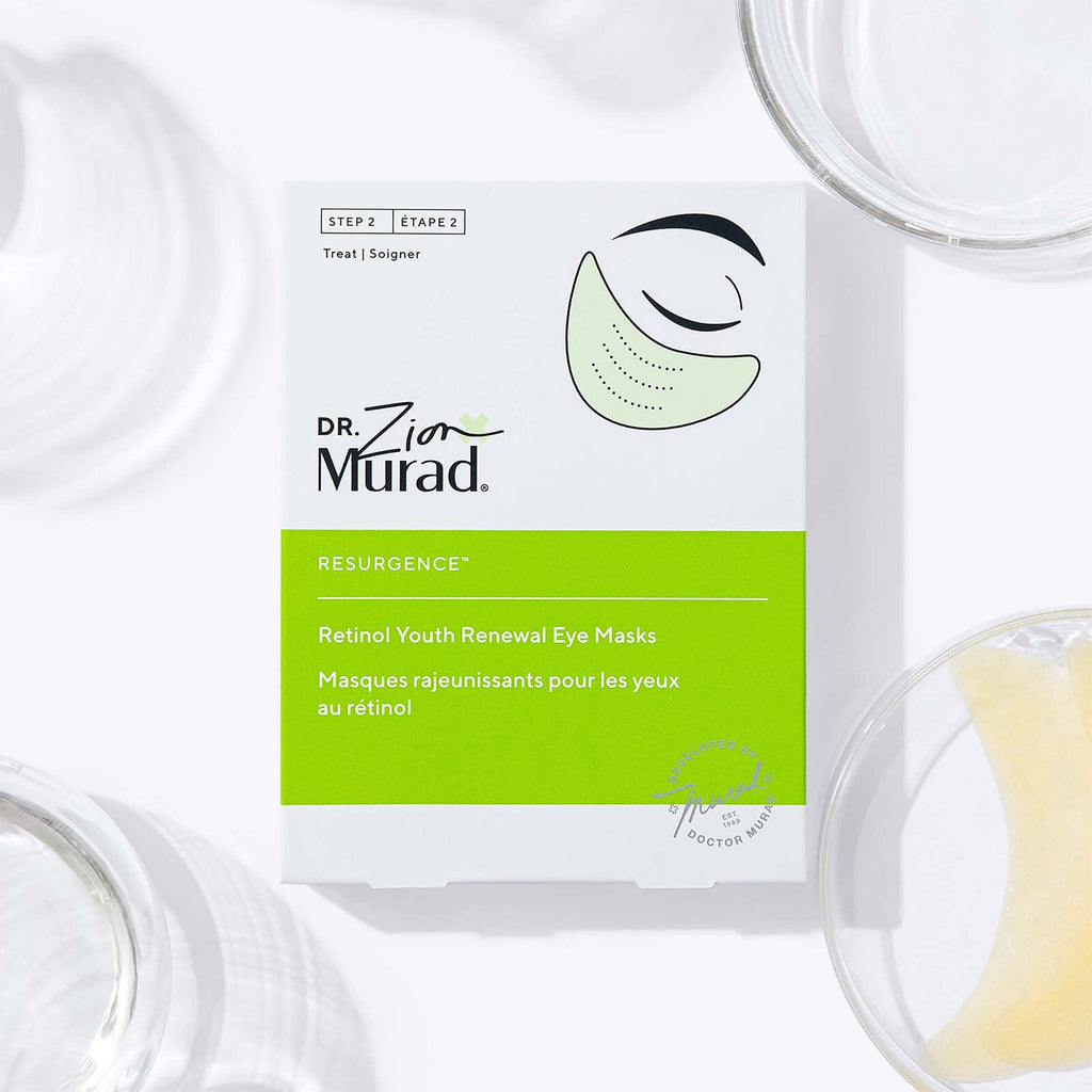 A box of Dr. Zion Murad Resurgence Retinol Youth Renewal Eye Masks, styled on a white background with glass containers in the background.