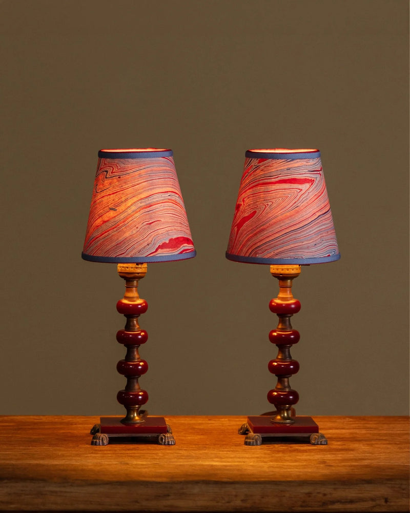 <p><strong>Pair of Red Bakelite Table Lamps w/ Marbled Shades, 1930's</strong></p>