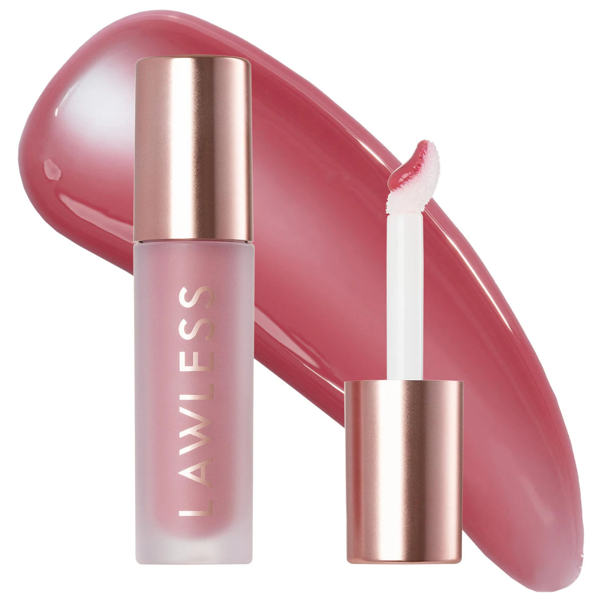 A frosted glass lip product tube with a rose gold cap stands next to its applicator wand, with a large glossy swatch of the pink lip color behind them on a white background. The brand name 'LAWLESS' is printed vertically on the tube.