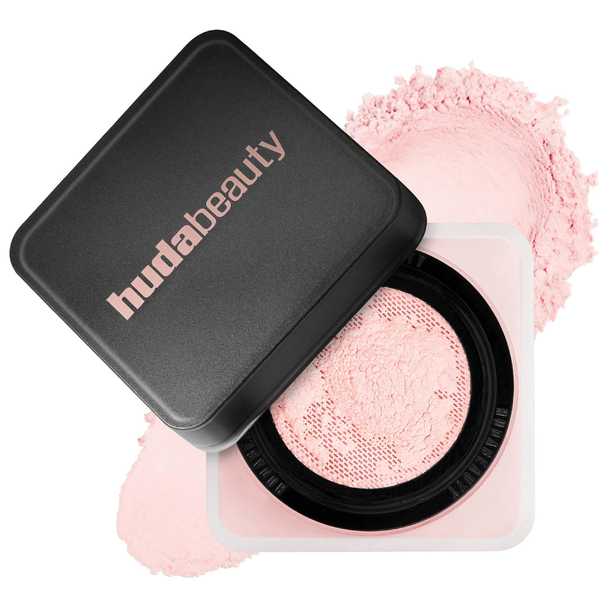 Huda Beauty compact with pink powder on a white background
