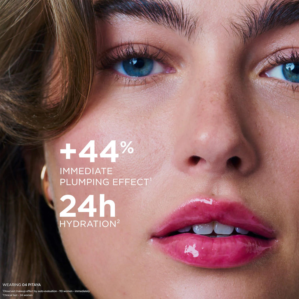 Close-up of a woman's face with cosmetic product application, highlighting plumping effect and hydration.