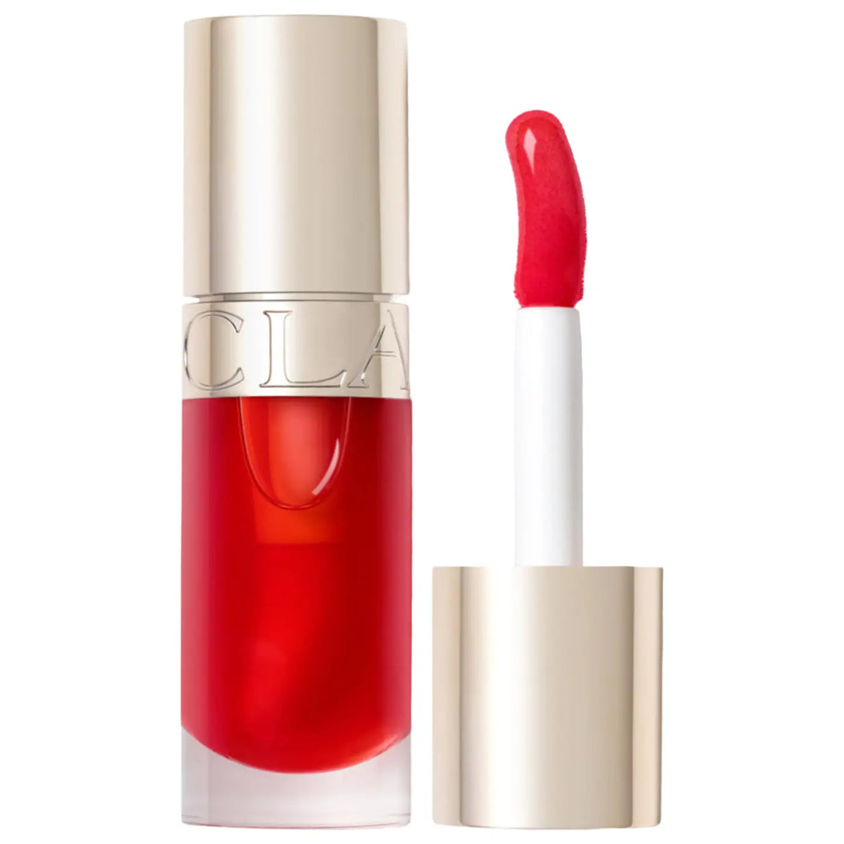 A clear glass tube of red liquid lipstick with a metallic gold cap, shown next to its applicator wand which has a bright red tip, on a solid white background.