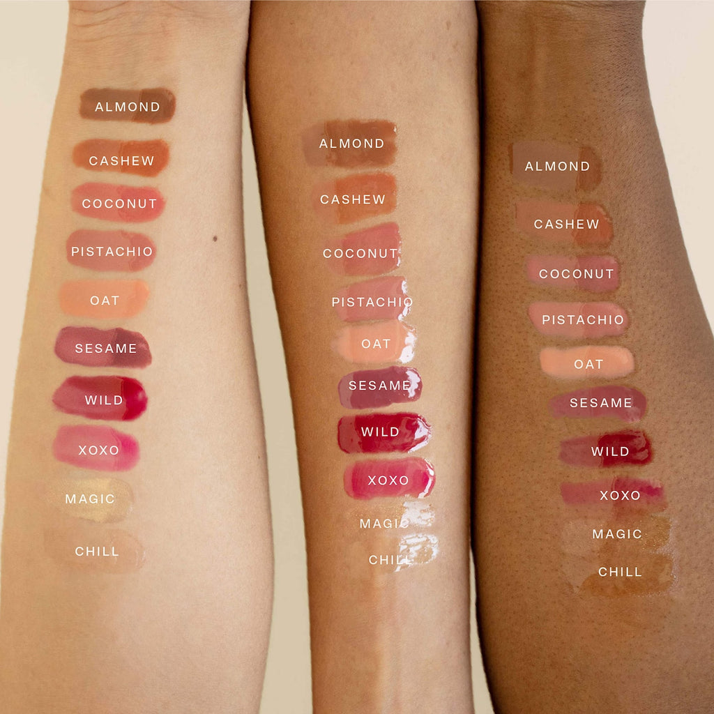 Lip color swatches on a person's arm with labels
