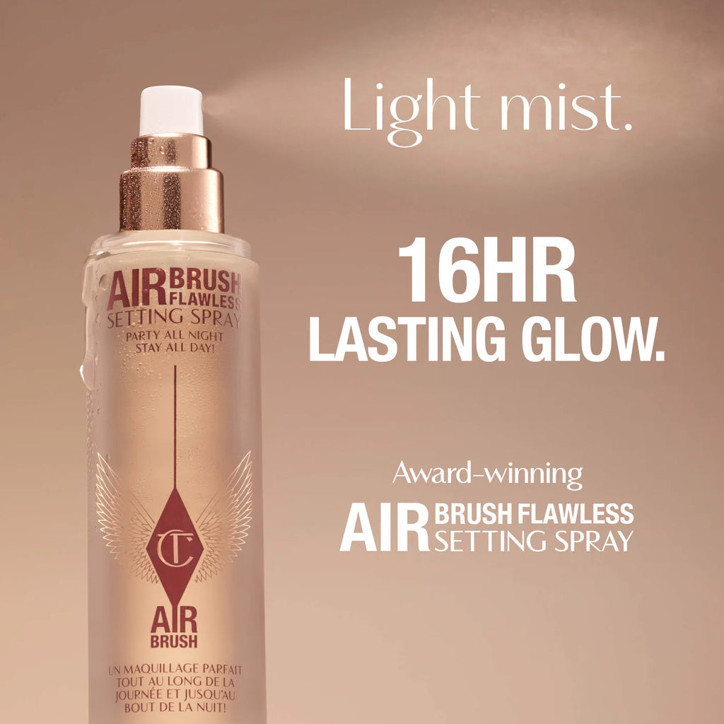 A bottle of Air Brush Flawless Setting Spray shown on a warm beige background with promotional text reading 'Light mist. 16HR LASTING GLOW.