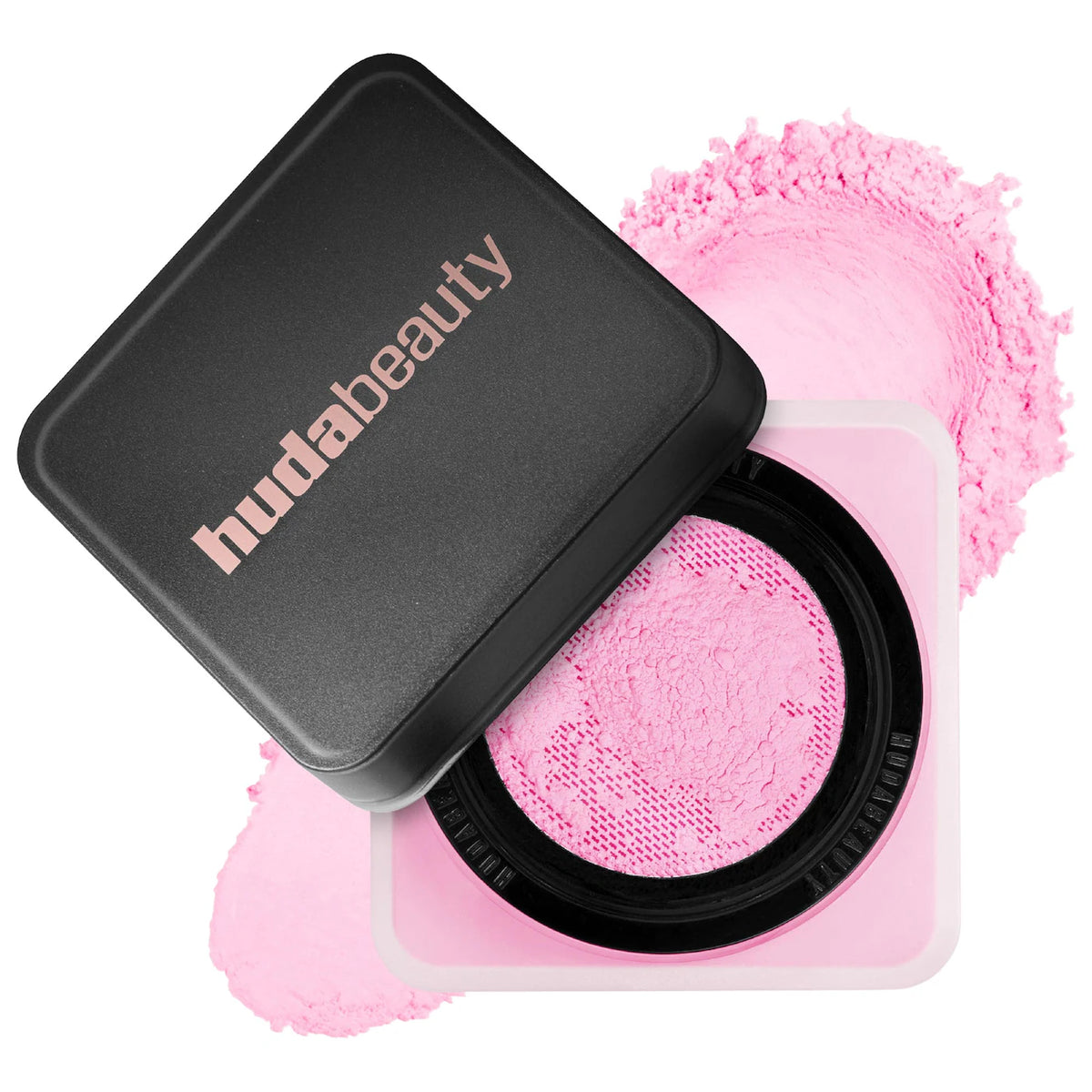 Huda Beauty compact with pink powder and applicator on a white background