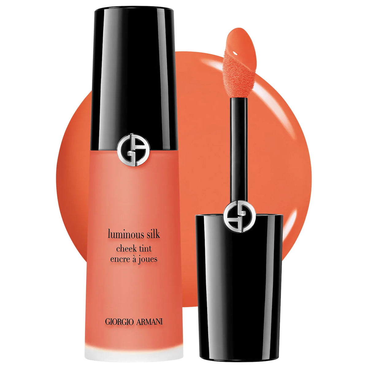 Giorgio Armani Luminous Silk Check Tint in a vibrant orange shade, showing the bottle, cap, and applicator wand against a white background with a matching orange circular swatch.