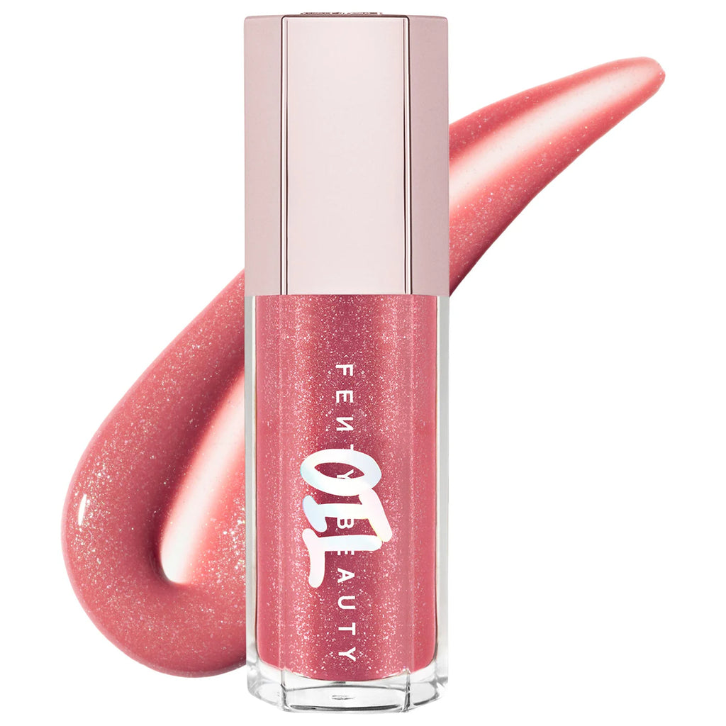 Pink glittery lip gloss with 'Fen Beauty' branding on a white background