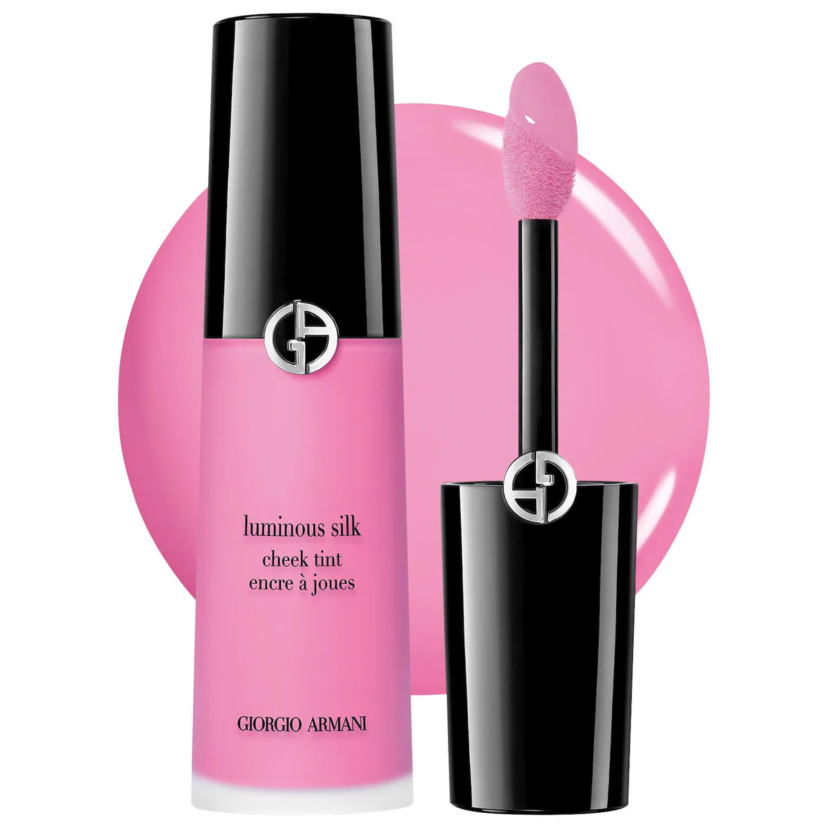 Giorgio Armani Luminous Silk Cheek Tint in a vibrant pink shade, showing the bottle and the applicator wand against a white background with a pink circular color swatch.