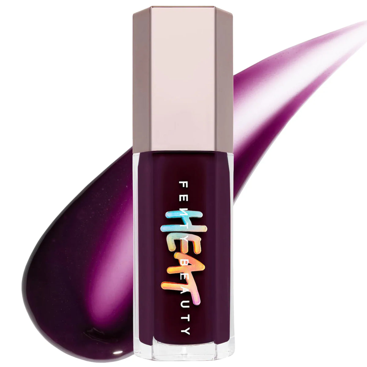 Fenty Beauty liquid lipstick in a deep purple shade, shown in its clear bottle with a metallic rose gold cap, set against a white background with a matching purple product smear.