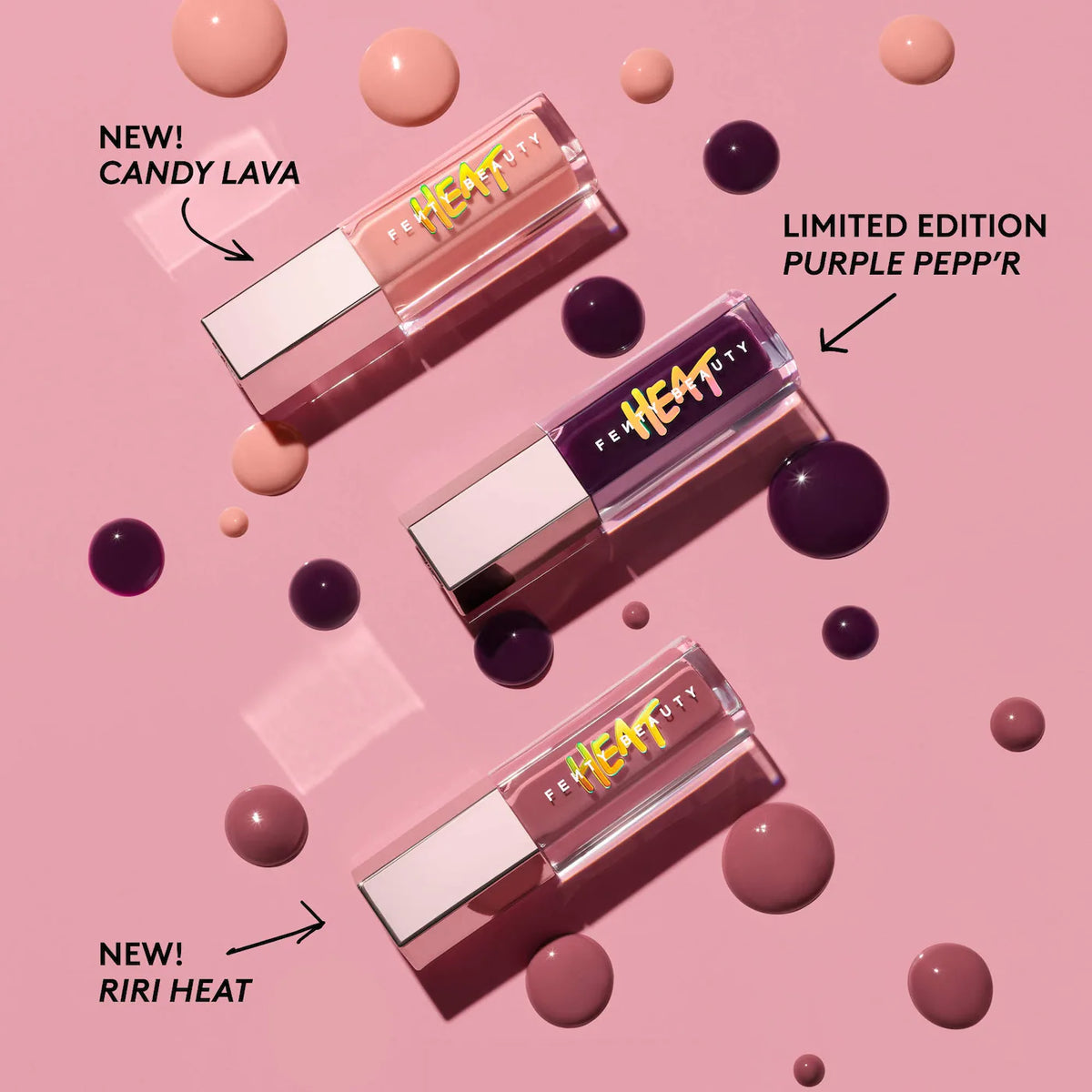 Three Perfection Beauty liquid lip products arranged on a pink background with decorative droplets. Text labels identify shades NEW! CANDY LAVA, LIMITED EDITION PURPLE PEPP'R, and NEW! RIRI HEAT.