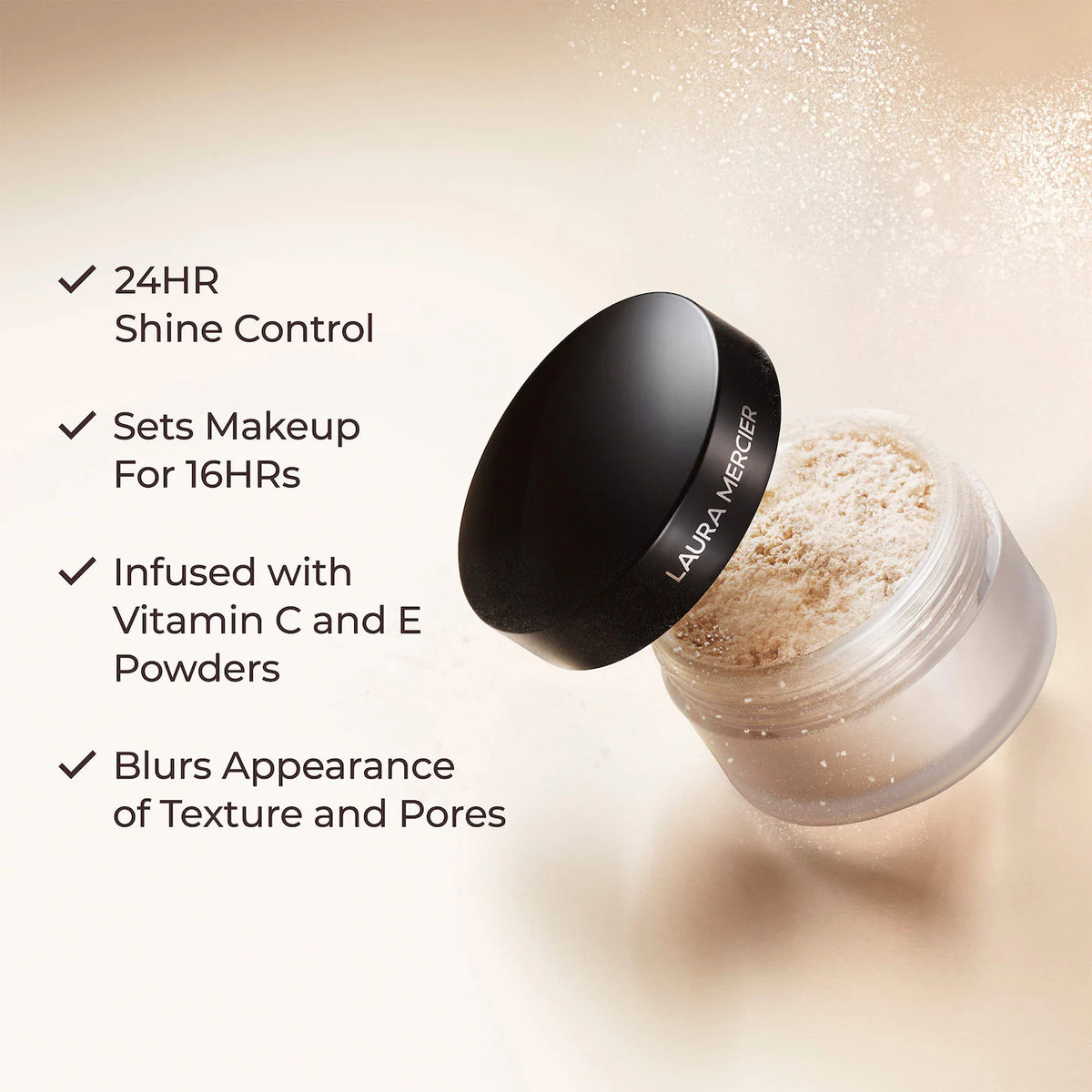Laura Mercier powder jar with product features listed on a beige background